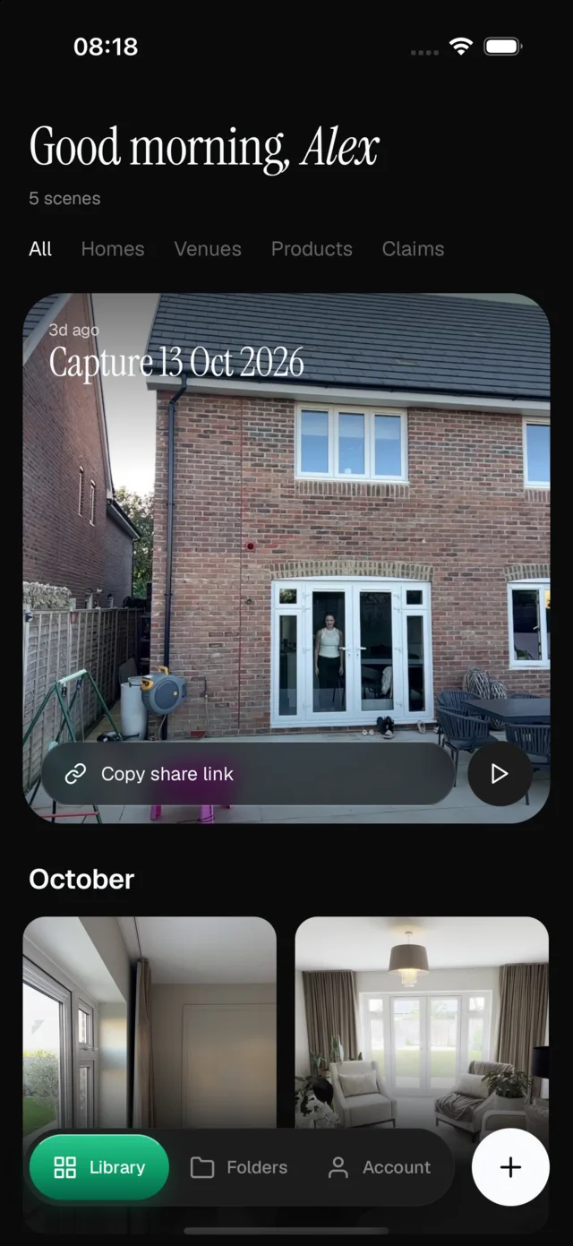 The iPhone app's library: the latest capture with a share link, sorted by month